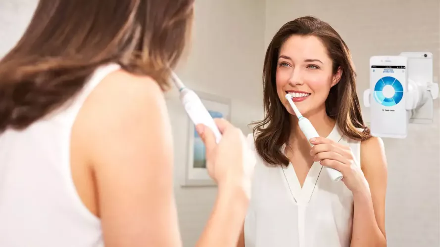 A smart toothbrush prototype with nanoparticle bristles